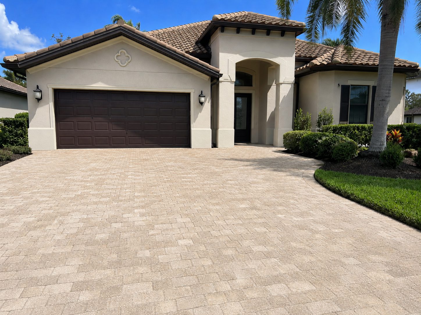 Paver driveway after pressure washing — clean, bright pavers